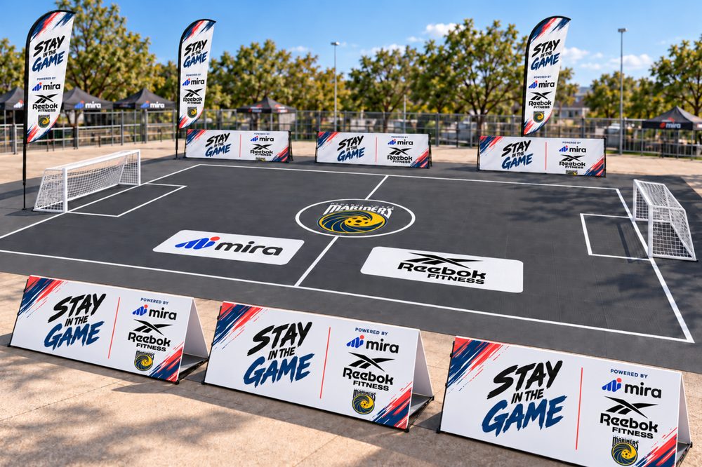 The Stay in the Game 3x3 court with partner signage