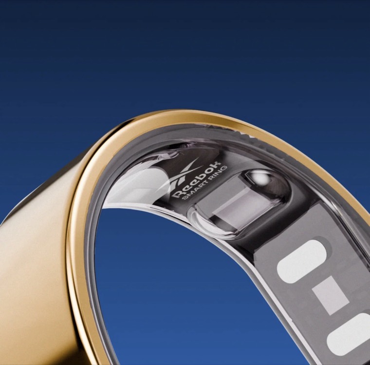 Close up of the Reebok smart ring sensors inside the gold band