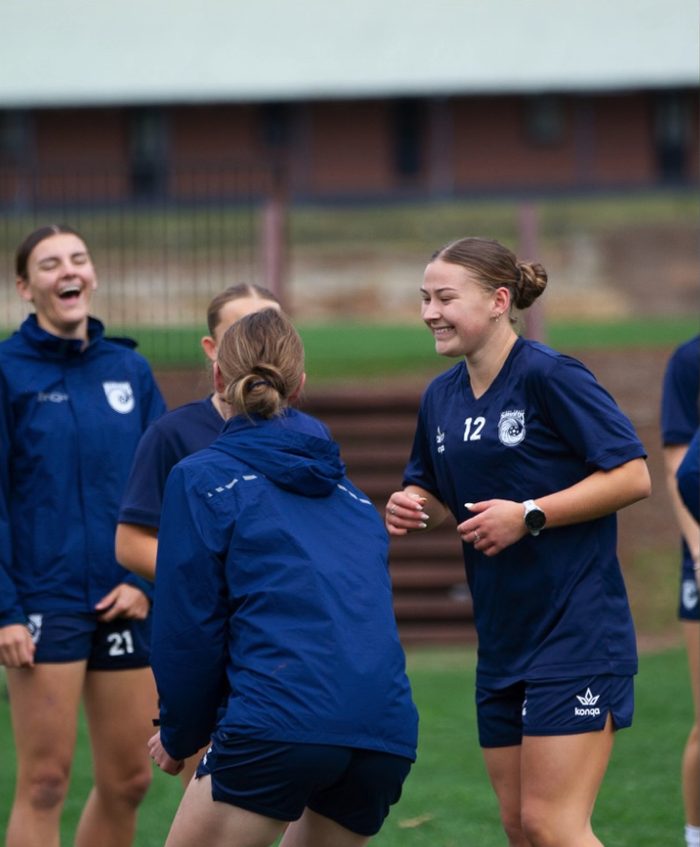 Mariners players laughing at training
